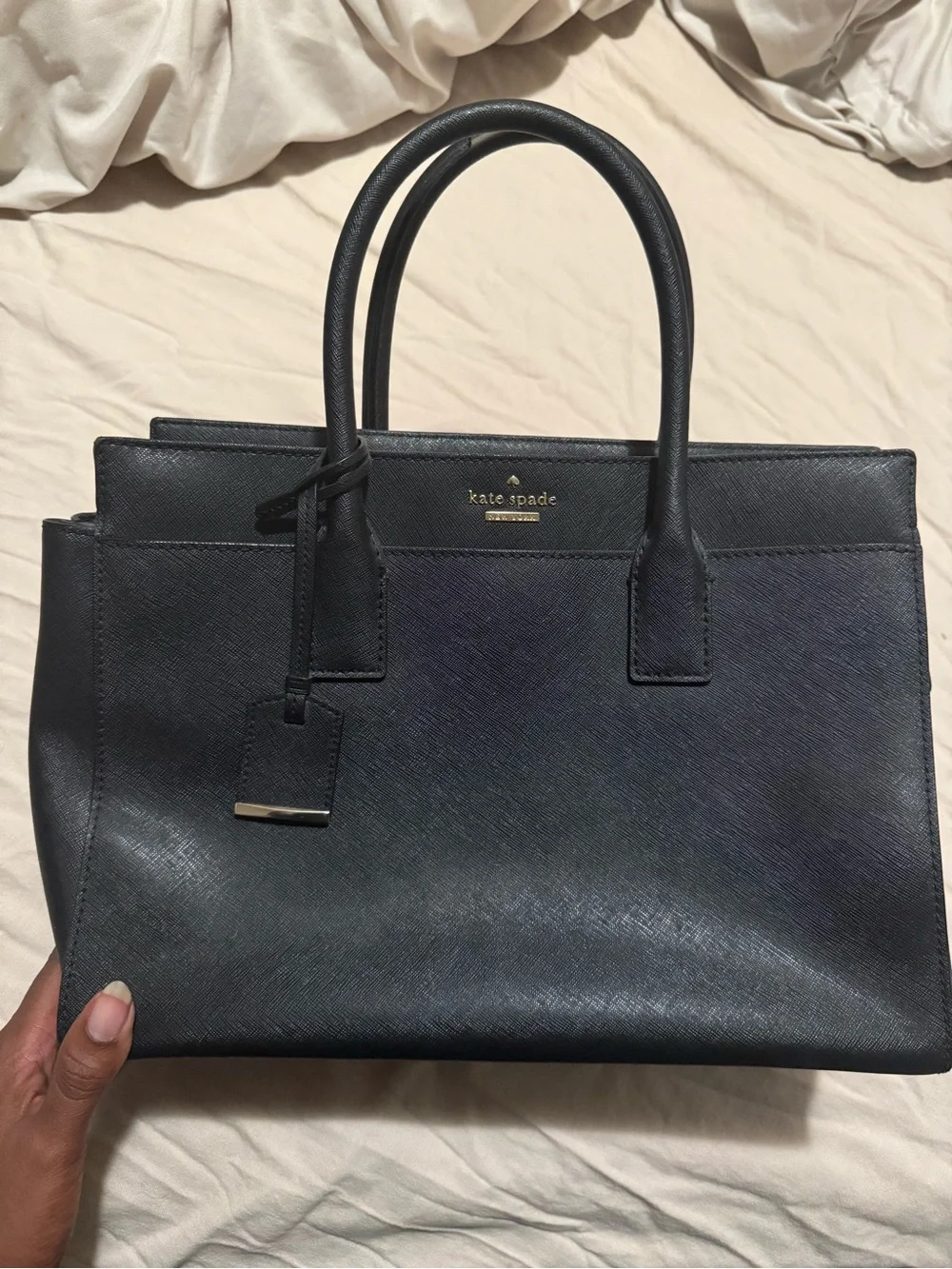 kate spade black leather tote with gold logo